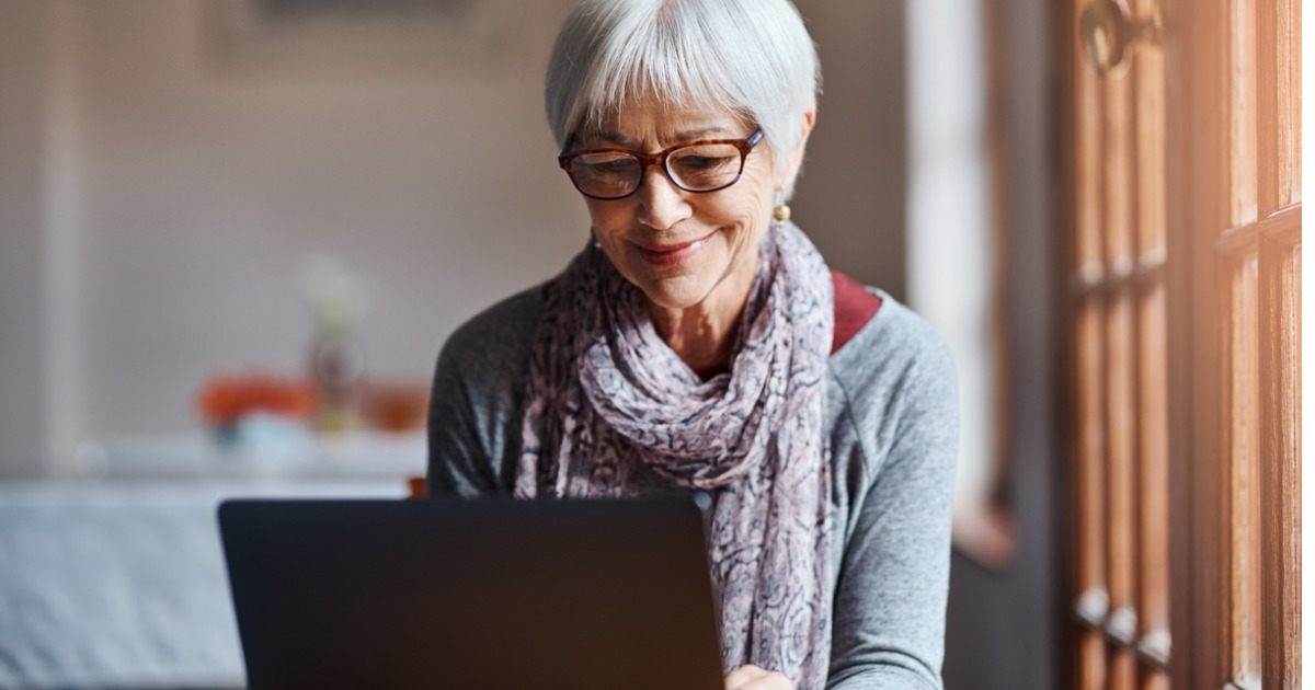 Middle Aged Woman Using Laptop